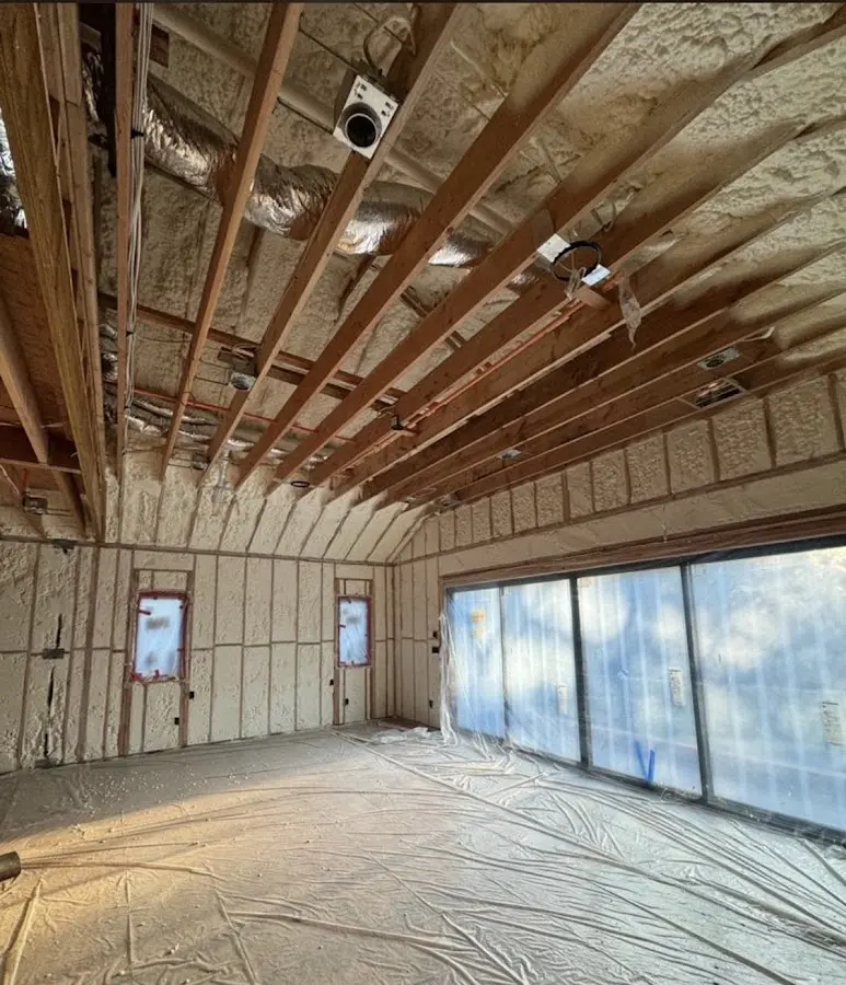 Interior walls and ceiling insulated with spray foam during new construction in Missoula